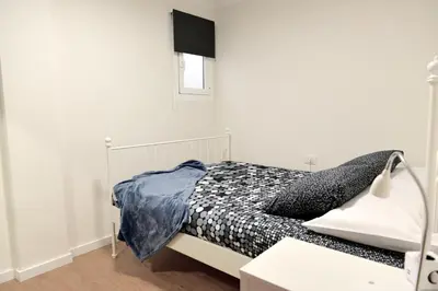 Cama o camas de una habitación en Apartamento Primera Línea Playa de Las Canteras