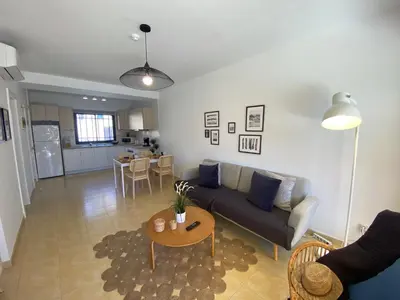 Zona de estar de Fantastico Duplex en Meloneras