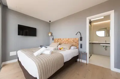 Cama o camas de una habitación en La Marine Boutique Hotel