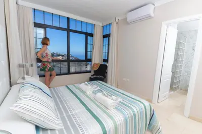 Cama o camas de una habitación en Villa Amadores n6