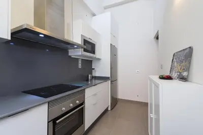 Una cocina o zona de cocina en La Bakery De Vegueta