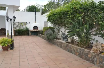 Jardín al aire libre en Bonita casa cálida para el relax con wifi