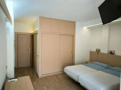 Cama o camas de una habitación en Relax and Beach