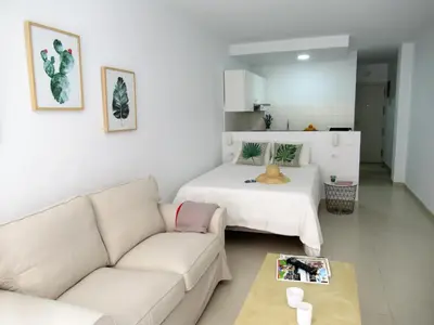 Zona de estar de Vivelorural Apartamento Canteras vista mar lateral