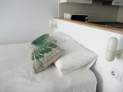 Cama o camas de una habitación en Vivelorural Apartamento Canteras vista mar lateral