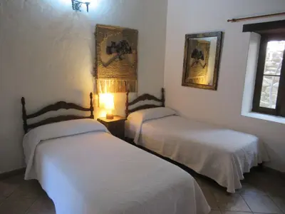 Cama o camas de una habitación en Vivelorural casa en Valle de Chira con piscina