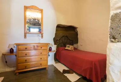 Cama o camas de una habitación en Casa Cueva El Caidero By Artenatur
