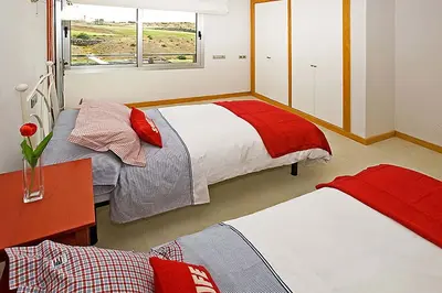 Cama o camas de una habitación en Salobre Vista Golf 18