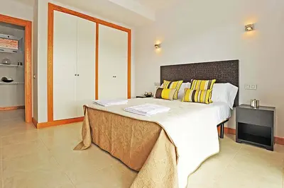 Cama o camas de una habitación en Salobre Vista Golf 27