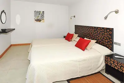 Cama o camas de una habitación en Salobre Vista Golf 28