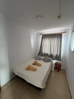 Cama o camas de una habitación en Apartamentos Buenavista