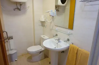 Un baño de Apartamentos Ecuador