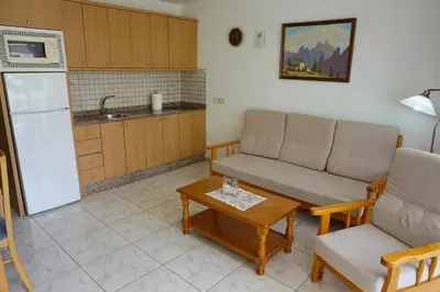 Una cocina o zona de cocina en Apartamentos Ecuador
