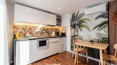 Una cocina o zona de cocina en Sunset Suites by Bull Hotels