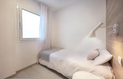 Cama o camas de una habitación en Plaza de La Feria Premium Apartments