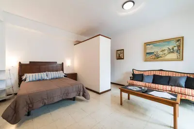 Cama o camas de una habitación en Loft luminoso y espacioso al lado de Las Canteras