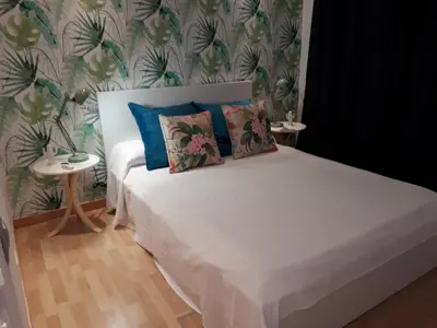 Cama o camas de una habitación en Maravillosas vistas al mar: Sounds of the Sea