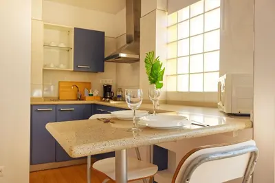 Una cocina o zona de cocina en Apartamentos Maype Canteras
