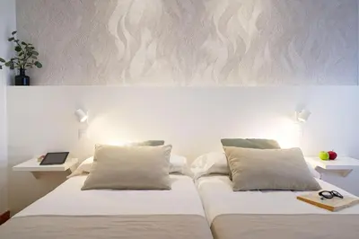 Cama o camas de una habitación en Apartamentos Maype Canteras