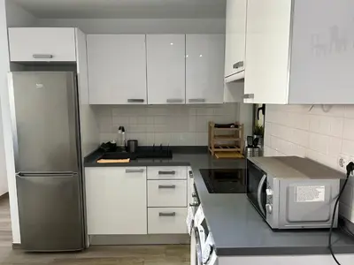 Una cocina o zona de cocina en Voyage Las Canteras Beach & Parking