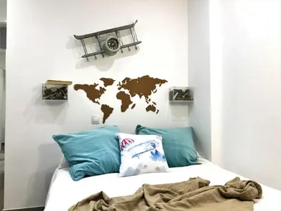 Cama o camas de una habitación en Voyage Las Canteras Beach & Parking