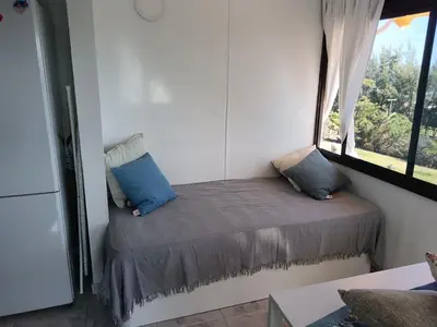 Cama o camas de una habitación en Monte Rojo San Agustin