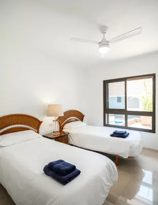 Cama o camas de una habitación en Villas Las Almenas