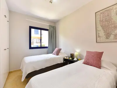 Cama o camas de una habitación en Villa Feliz 128