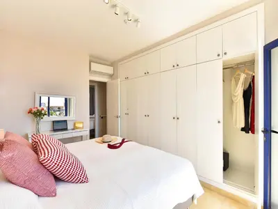 Cama o camas de una habitación en Villa Feliz 128