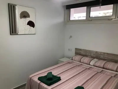 Cama o camas de una habitación en Apartamentos Aloe