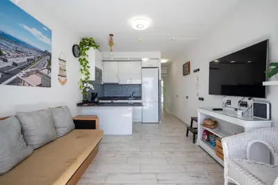 Una cocina o zona de cocina en Apartamentos Playa Feliz