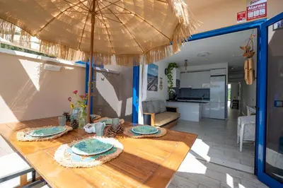Una cocina o zona de cocina en Apartamentos Playa Feliz