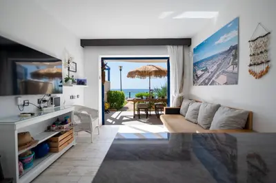 Zona de estar de Apartamentos Playa Feliz