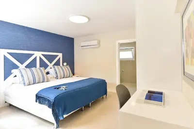 Cama o camas de una habitación en Blue Ocean by VillaGranCanaria
