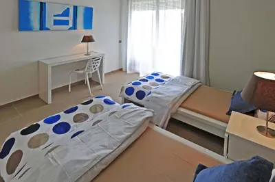 Cama o camas de una habitación en Salobre Los Dragos 12