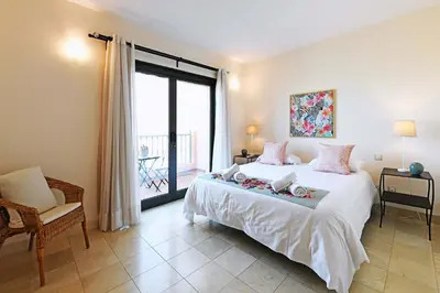 Cama o camas de una habitación en Salobre Morro Golf 1