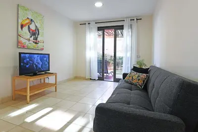 Una televisión o centro de entretenimiento en Salobre Morro Golf 2