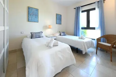 Cama o camas de una habitación en Salobre Morro Golf 5