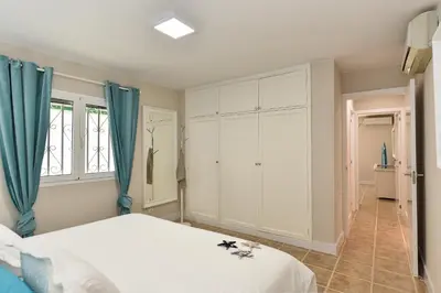 Cama o camas de una habitación en The Secret Garden Holiday Home
