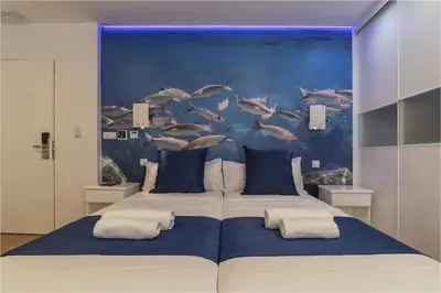Cama o camas de una habitación en Hotel Ciudad del Mar