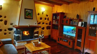 Una televisión o centro de entretenimiento en Villa el Manantial
