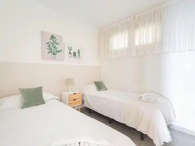 Cama o camas de una habitación en Mogan Beachfront | CarmitAtHome