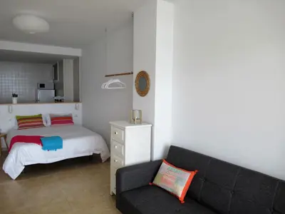 Cama o camas de una habitación en Vivelorural Canteras 208 beach front with wifi