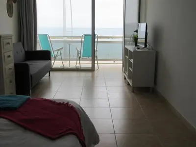 Cama o camas de una habitación en Vivelorural Canteras 208 beach front with wifi
