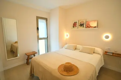 Cama o camas de una habitación en Minimalist Home Canteras Beach