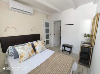 Cama o camas de una habitación en La Casita de Juani,La Suerte