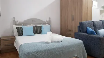 Cama o camas de una habitación en Loft en La Aldea de San Nicolas