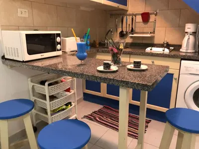 Una cocina o zona de cocina en Bungalow Playmar