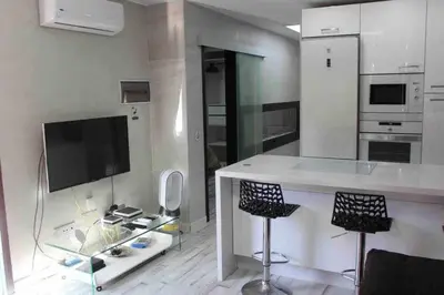 Una cocina o zona de cocina en Apartamento con diseño moderno y piscina Taurito
