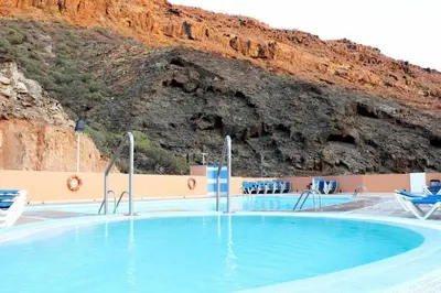 Piscina en o cerca de Apartamento con diseño moderno y piscina Taurito